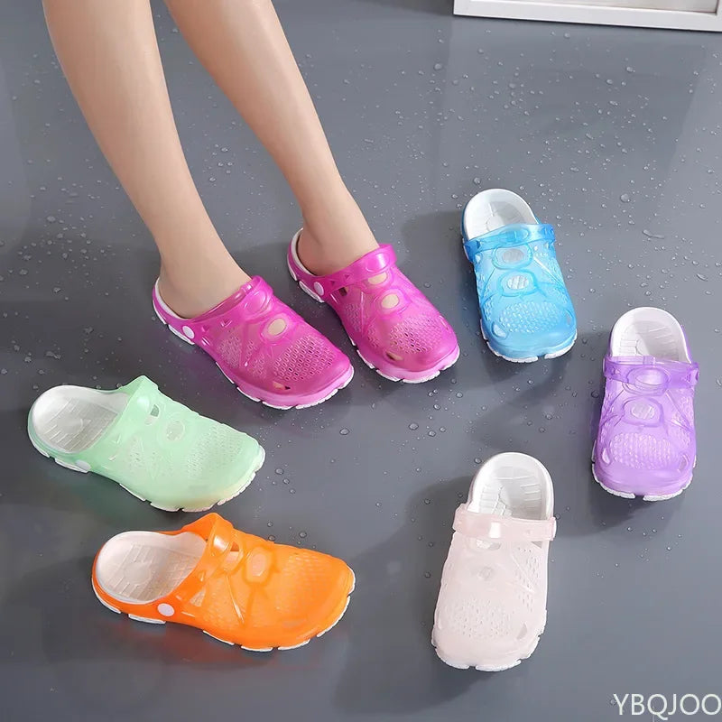 Showlu Women's casual jelly sandals with flat design, suitable for outdoor beach and water activities, featuring colorful translucent straps.
