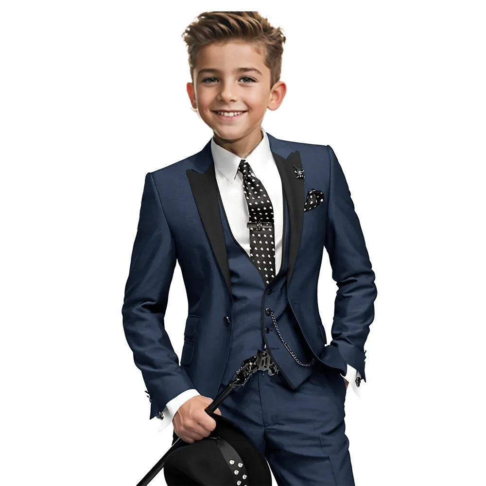 Navy blue boys tuxedo set with blazer, pants, and vest, suitable for formal occasions and weddings for ages 2-16.