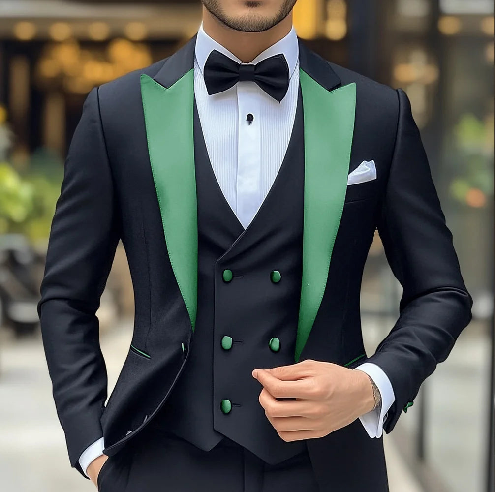 Black men's groom wedding tuxedo 3-piece suit with blazer, vest, and pants, featuring peak lapels and slim fit style.