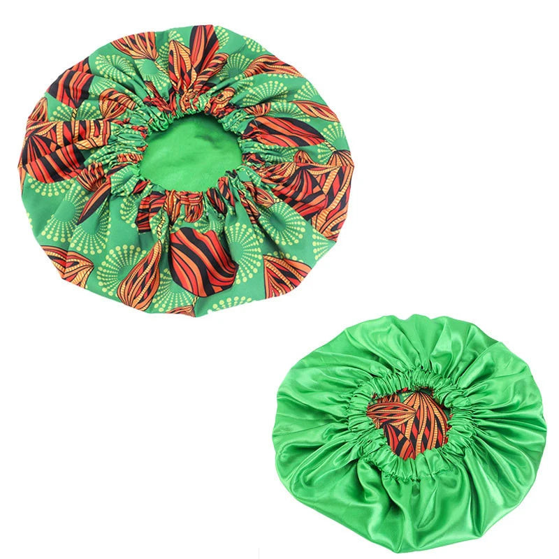 Women’s African pattern Ankara print sleep cap with satin lining, soft and extra large headwrap for hair care and night wear.