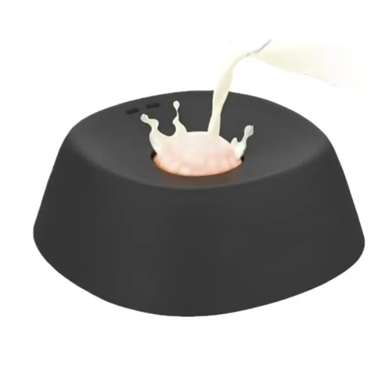 Slow feeder dog bowl with ball-in design for liquid treats, bone broth, or yogurt, made by Showlu Fashion Store.