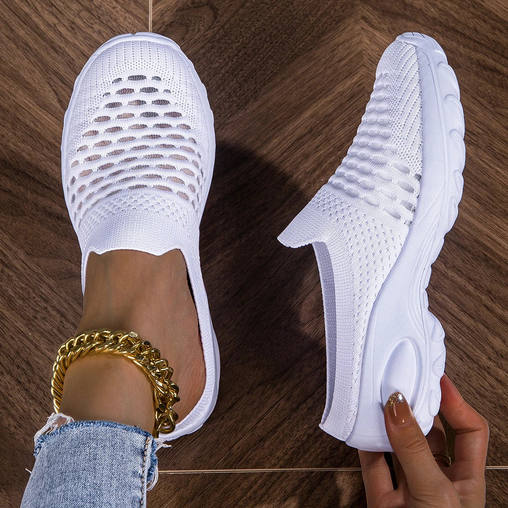 Women's breathable mesh slip-on sneakers by SHOWLU FASHION STORE, lightweight and comfortable flats for active wear.