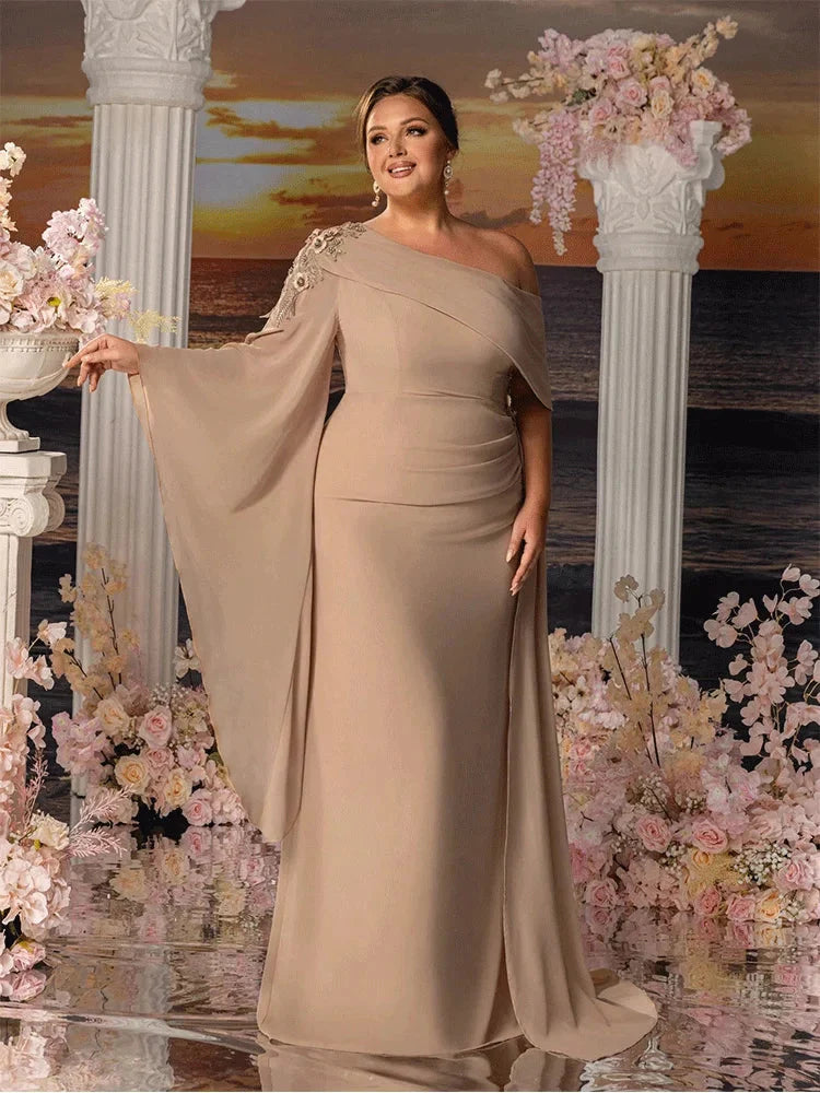 Apricot chiffon plus size strapless floor-length gown by Showlu Fashion, flowing elegant evening dress with a fitted bodice.
