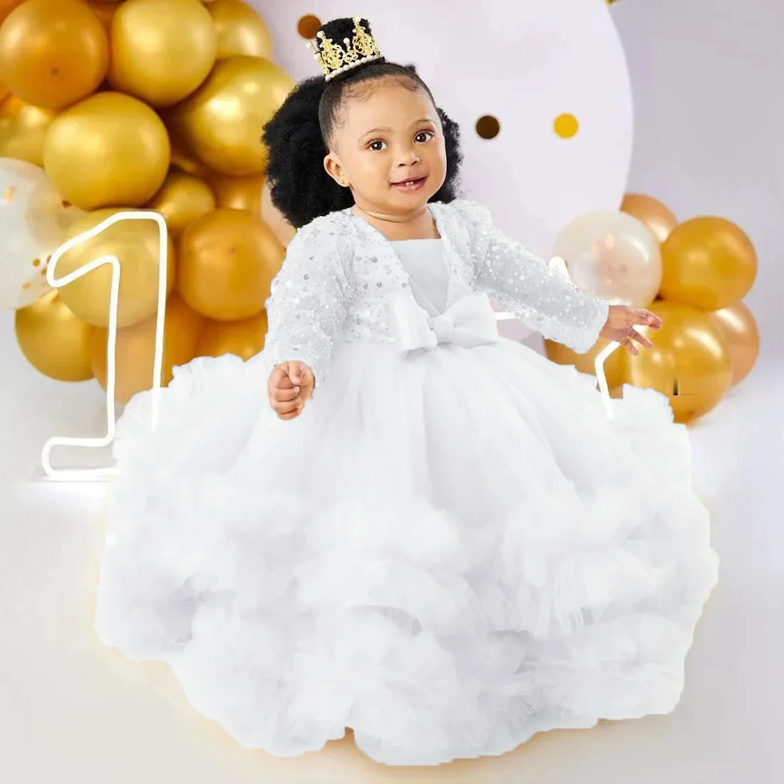 Baby girl flower girl dress with sequins, full sleeves, floor length, for weddings, photoshoots, and first communions by Showlu Fashion.