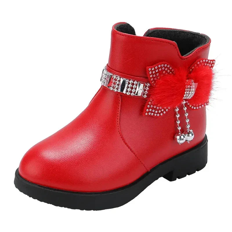 Girls winter ankle boots by ROMSUNS in plush PU leather, featuring a stylish and cozy design for cold weather.
