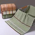 SHOWLU 100% cotton hand towel with thickened solid face design, ideal for bathroom use in a soft, absorbent material.