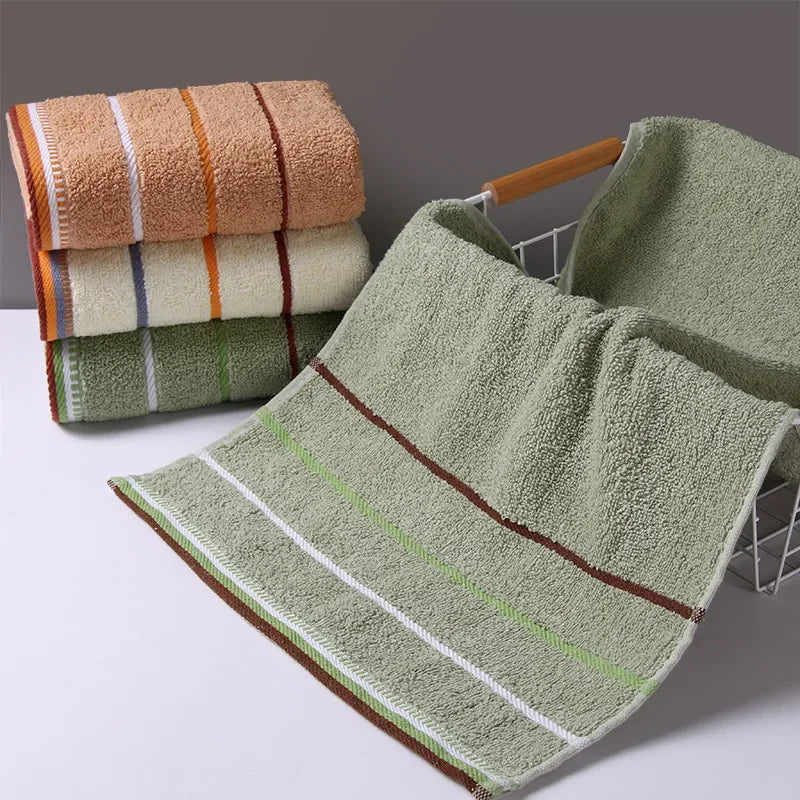 SHOWLU 100% cotton hand towel with thickened solid face design, ideal for bathroom use in a soft, absorbent material.