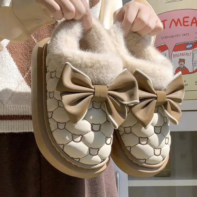 Women's platform snow boots with bowknot detail and furry lining, stylish winter booties by SHOWLU FASHION STORE.