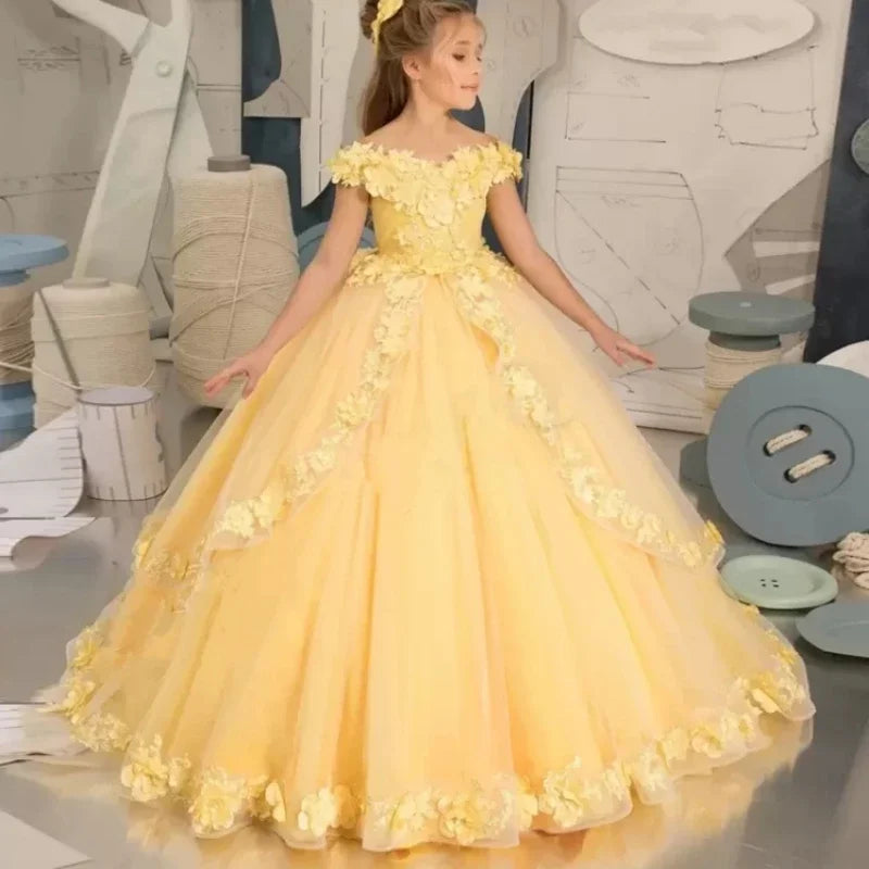 Yellow flower girl dress by Showlu Fashion with beading, appliqué details, suitable for pageants, birthdays, and first communion.