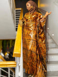 Printed Ankara women's traditional wedding and party long dress with brocade fabric, featuring vibrant patterns and elegant design.