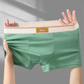 Breathable men's boxer shorts made of milk silk, featuring a comfortable fit and sexy design for everyday wear.