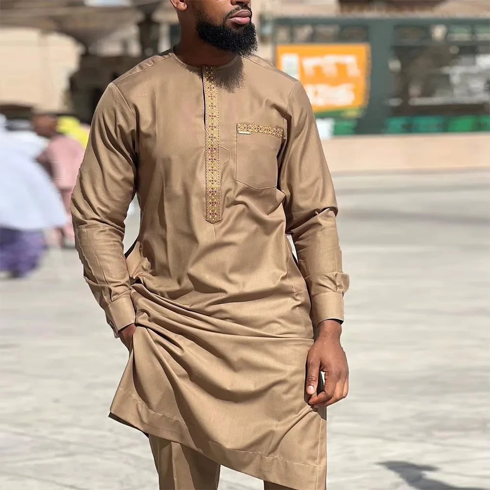 Men's 2-piece African Kaftan set with traditional dashiki design, featuring vibrant patterns and comfortable fit by SHOWLU FASHION STORE