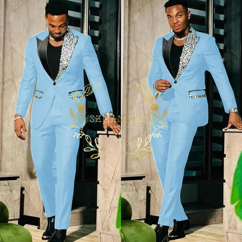 Slim fit black men's suit with single-breasted blazer and matching pants, featuring peak lapel and high-quality craftsmanship.
