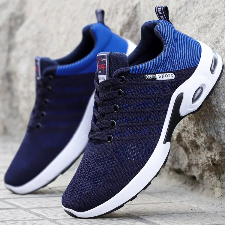 Men's breathable air mesh running shoes by SHOWLU FASHION STORE, lightweight casual sports footwear with breathable mesh upper.