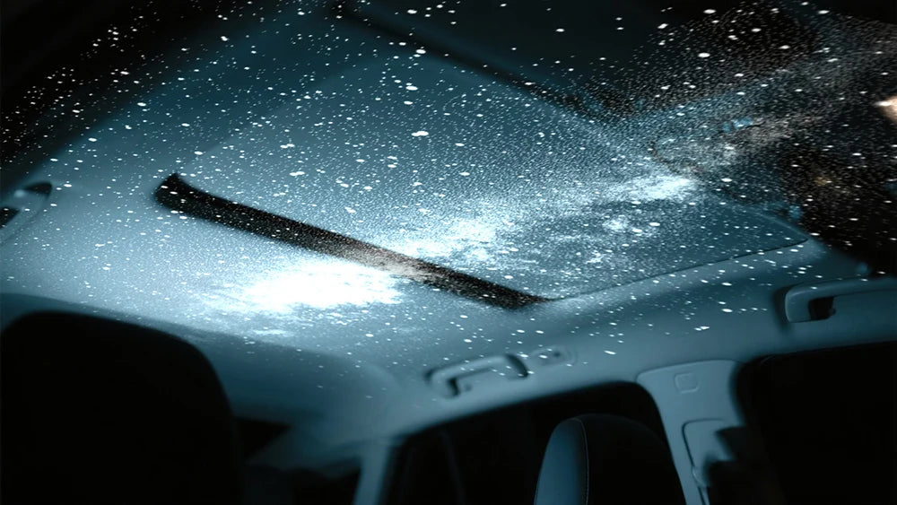Showlu Smart General Car LED Roof Star Light installed on vehicle ceiling, creating a starry sky effect inside the car.
