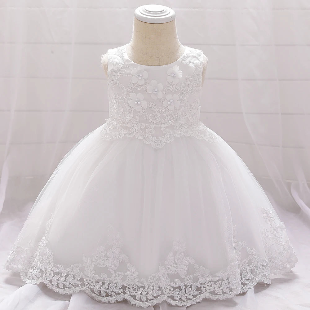 Baby girl white tulle flower dress by Showlu Fashion Store, perfect for baptism and first birthday celebrations.