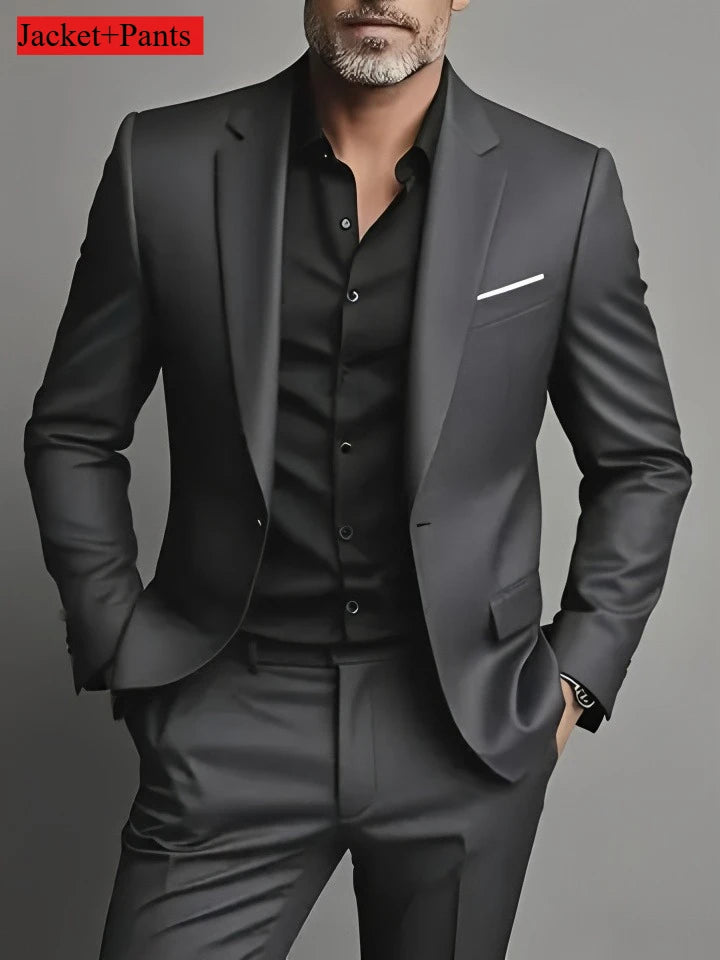Elegant black men's slim fit tuxedo suit set for weddings and formal occasions, featuring a tailored jacket and matching trousers.