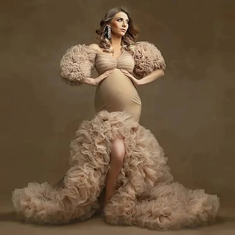 Deep V-neck lace maternity dress with tulle fabric, long sleeves, feather details, perfect for photoshoots and special occasions.