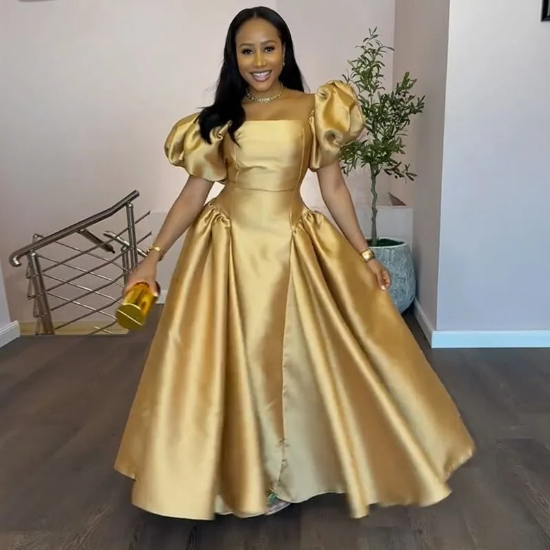 Elegant women's puff sleeve dress with square collar, pleated A-line design, in gold solid fabric, perfect for evening parties and cocktails.