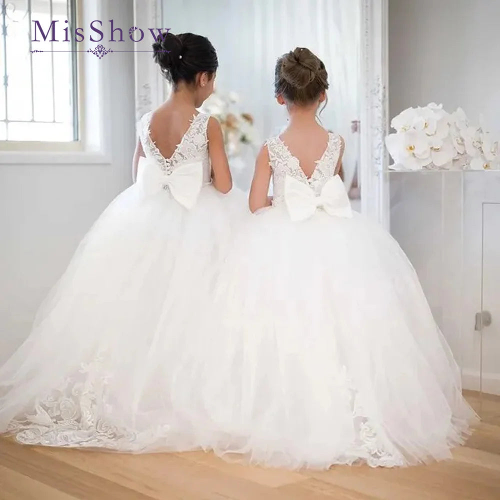 MisShow flower girl dress by Showlu Fashion Store, lace tulle princess ball gown for weddings, white with delicate floral details.