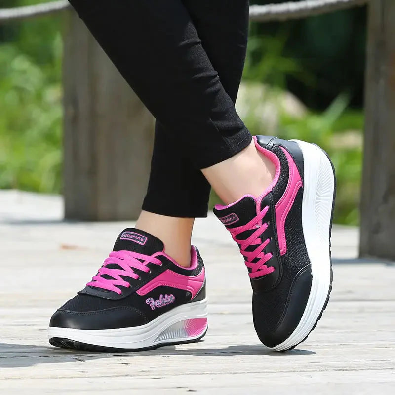 Women's breathable mesh walking sneakers by LIZUXIE with platform flats, featuring comfortable design and stylish athletic look.