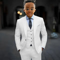 Dark grey boys' suit by Showlu Fashion featuring a slim fit, single-breasted jacket, pants, and vest with peak lapels.