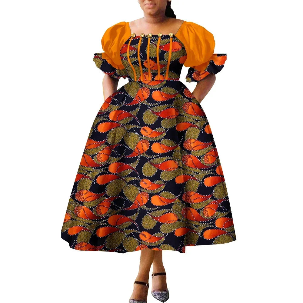African print puff sleeve high waist Ankara cotton gown by SHOWLU FASHION STORE featuring vibrant patterns and a fitted silhouette.