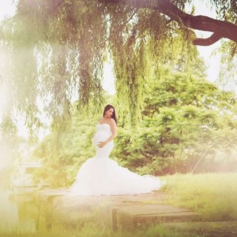 Wheat&Turtle lace maternity gown with short sleeves, elegant maxi design, perfect for photography and maternity photoshoots.