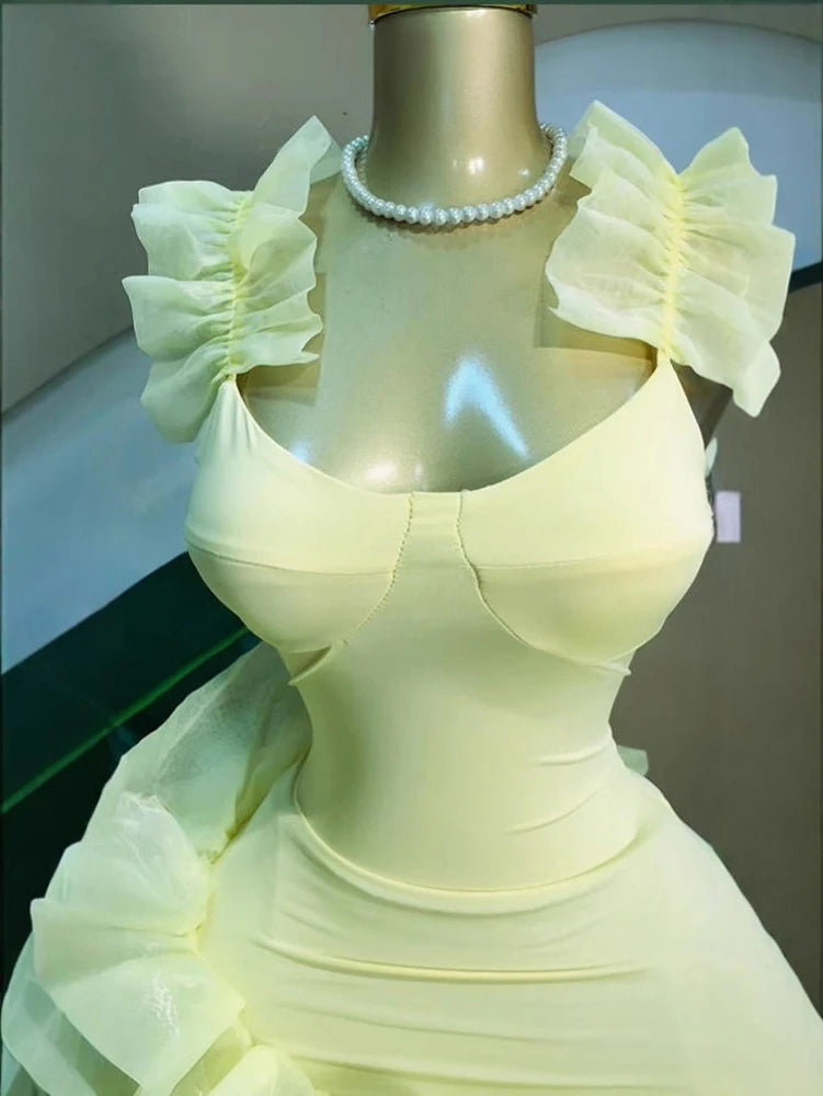Luxury ruffled u-neck mini dress by Showlu Smart General featuring elegant and sexy design with stylish ruffle details.