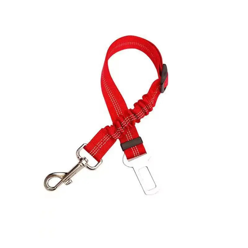 Showlu Smart General pet car seatbelt harness attached to a small dog, ensuring safety during car rides.