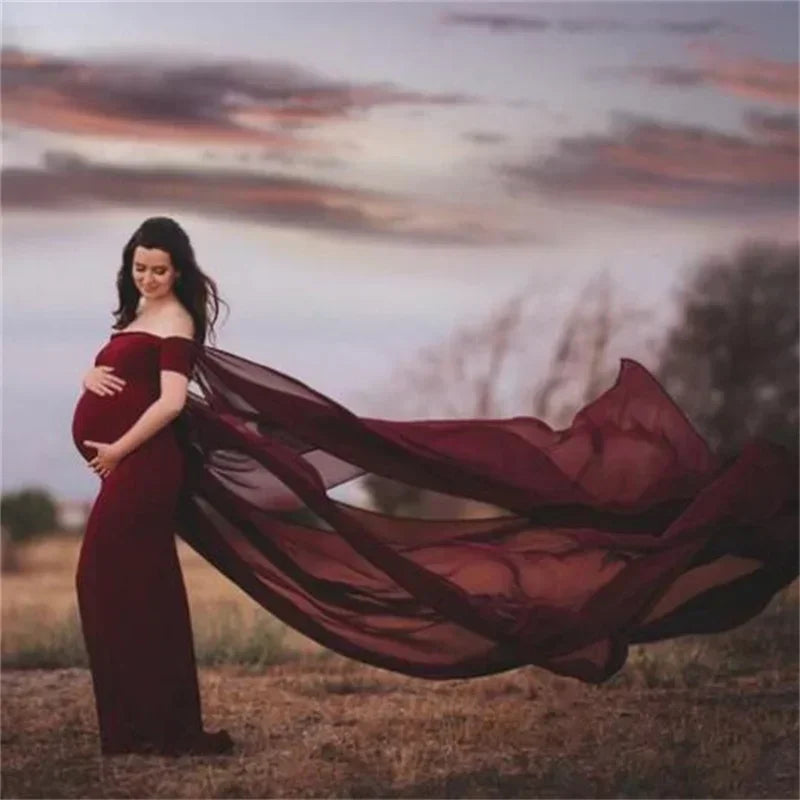 SHOWLU shoulderless chiffon maternity maxi gown for photography, elegant flowy dress for expectant mothers in a photoshoot setting