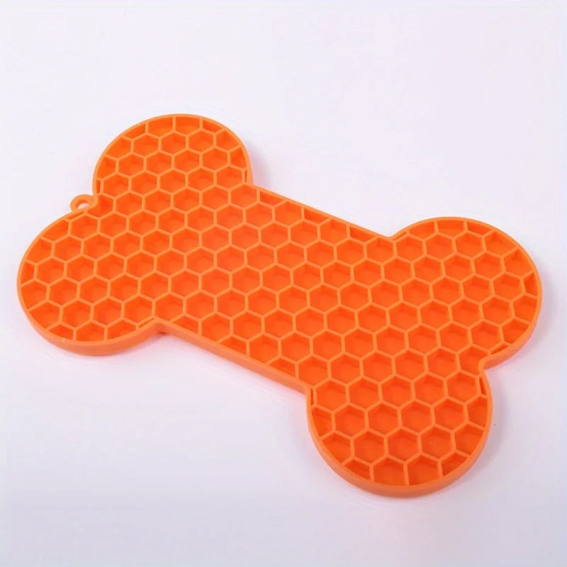 Silicone dog licking pad with bone shape for pets, designed for slow feeding and pet enrichment, suitable for dogs and cats.