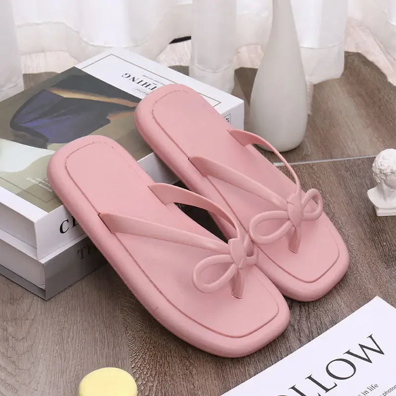 Women's summer flip flops by SHOWLU FASHION STORE, flat PVC slides with open-toe design and casual sandal style.