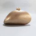 Blue acrylic shell-shaped clutch bag for women, designer evening purse with pearl accents, perfect for parties and special occasions.
