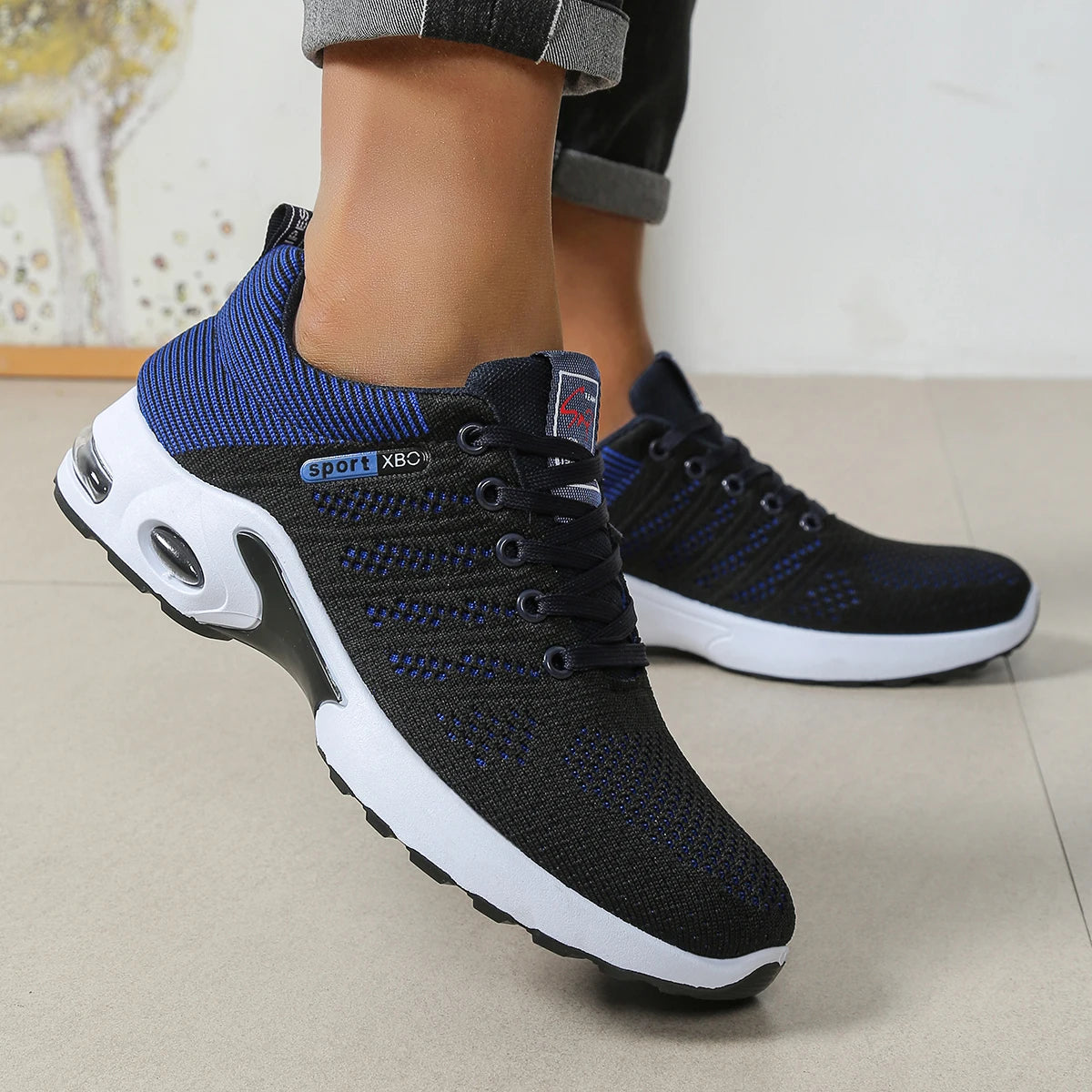 Men's breathable lace-up running shoes with non-slip soles, durable design, and cushioned comfort, in stylish men's fashion sneakers.