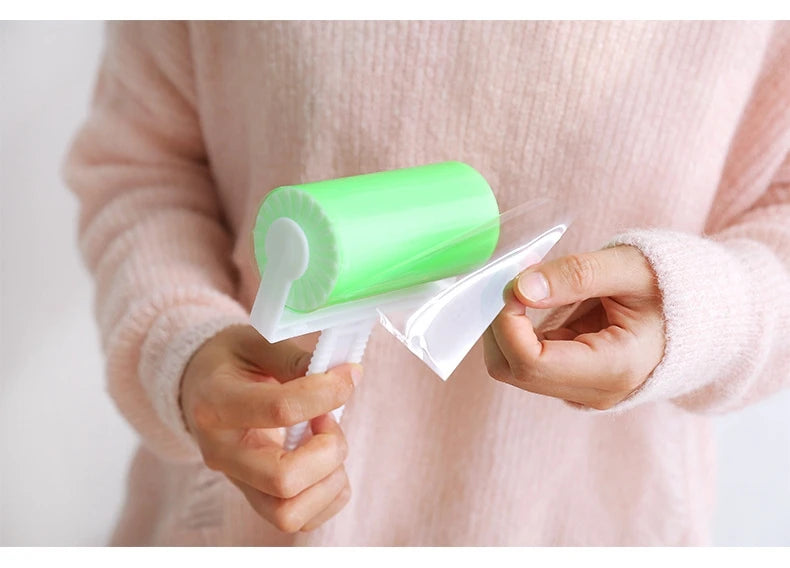 Showlu Smart General Pet Hair Roller Pro removing pet hair from upholstery and clothing with a reusable lint roller.