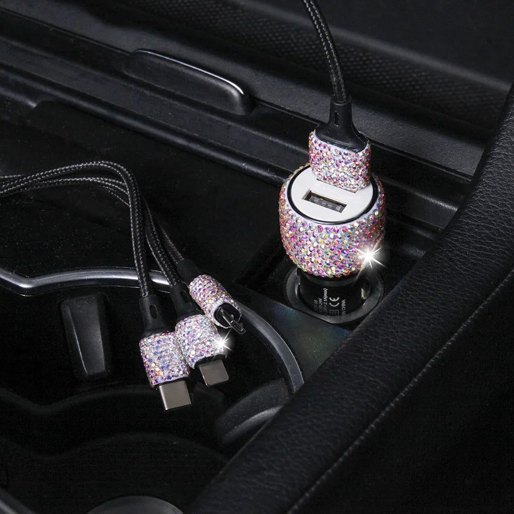 Pink crystal Showlu dual USB car charger with 3-in-1 charging cable for fast device charging in vehicles.