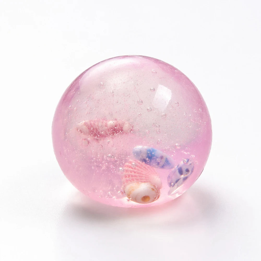 Transparent squishy maltose stress ball from Showlu Fashion Store, slow-rise sensory ball for hand exercise and stress relief.