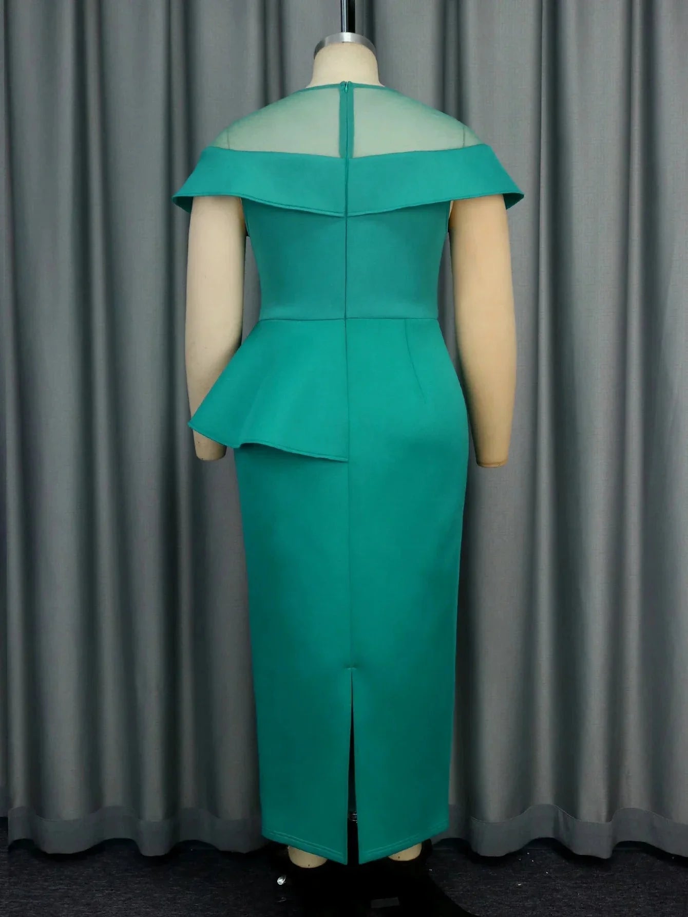 Elegant green cape sleeve sheath evening dress with appliques, featuring a fitted silhouette and intricate detailing.