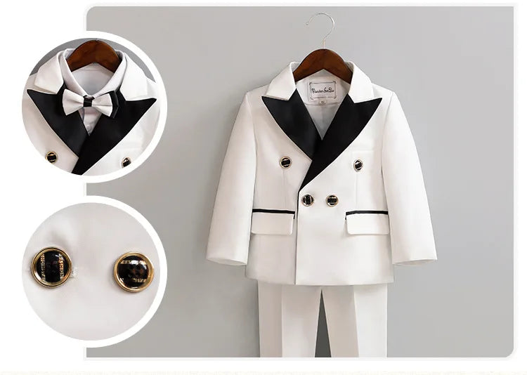 Children's white wedding suit with jacket, pants, and bowtie, perfect for flower boys and birthday parties by Showlu Fashion Store.