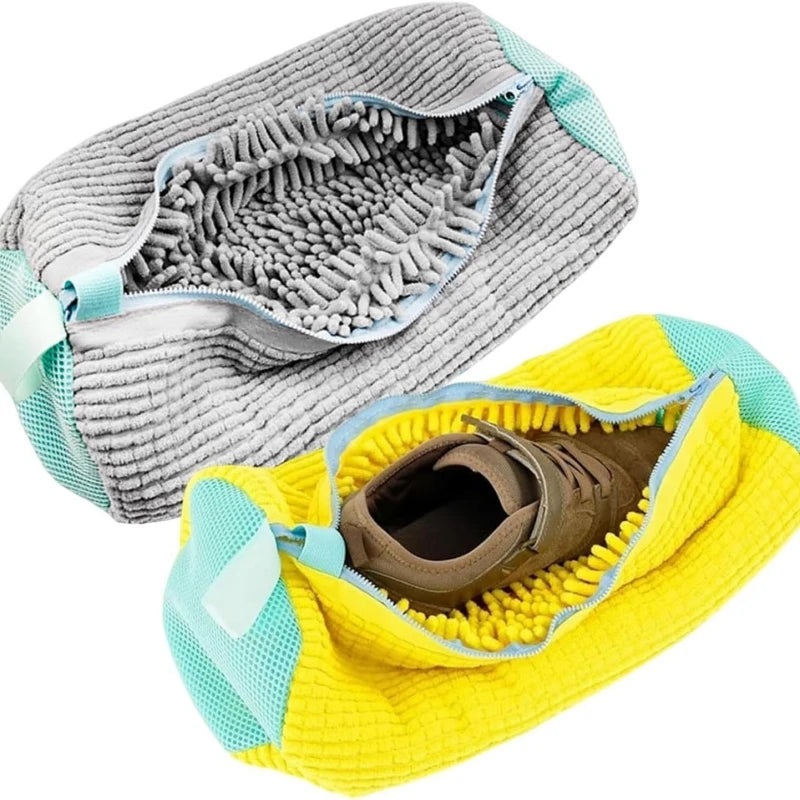 Showlu Smart General portable shoe cleaner brush with bristles and handle for easy footwear cleaning.