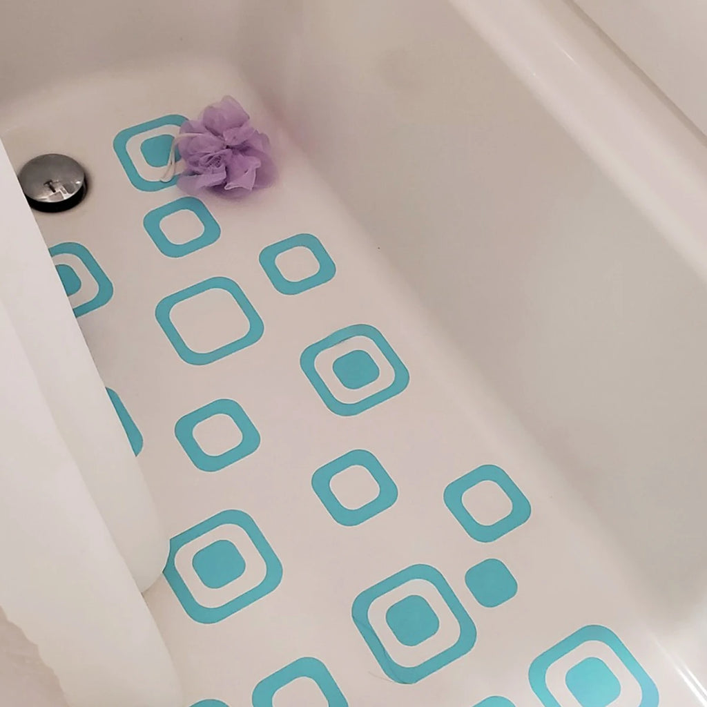 Showlu Smart General anti-slip bath stickers on a bathtub surface, providing safe, textured grip for preventing slips and falls.