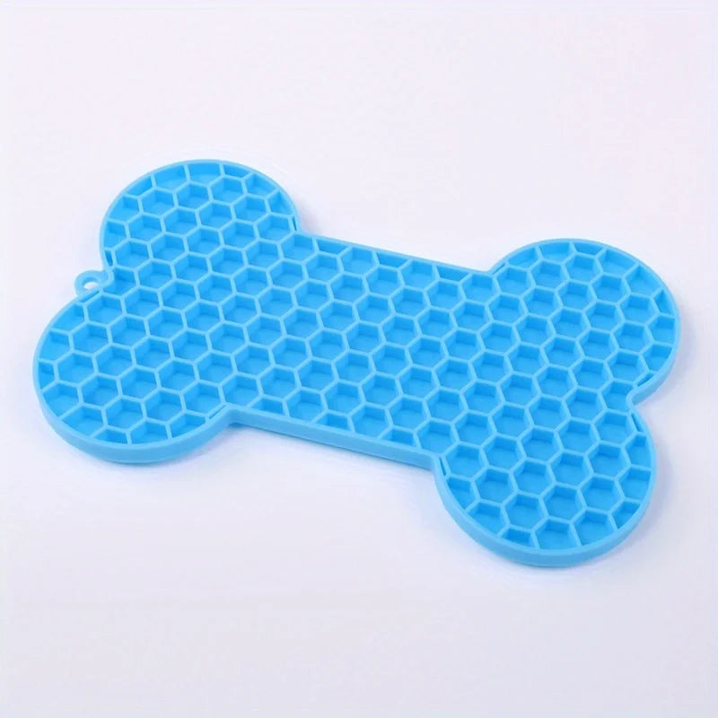 Silicone dog slow food pad with bone shape, designed for pet licking and feeding, suitable for dogs and cats.