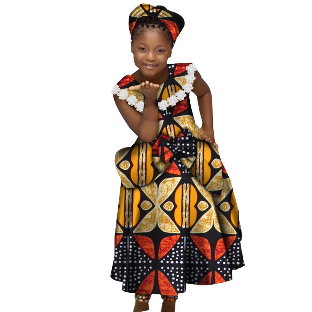 GuyaWax girls African print mermaid dress in cotton Bazin Riche Dashiki featuring vibrant traditional patterns and fitted silhouette.
