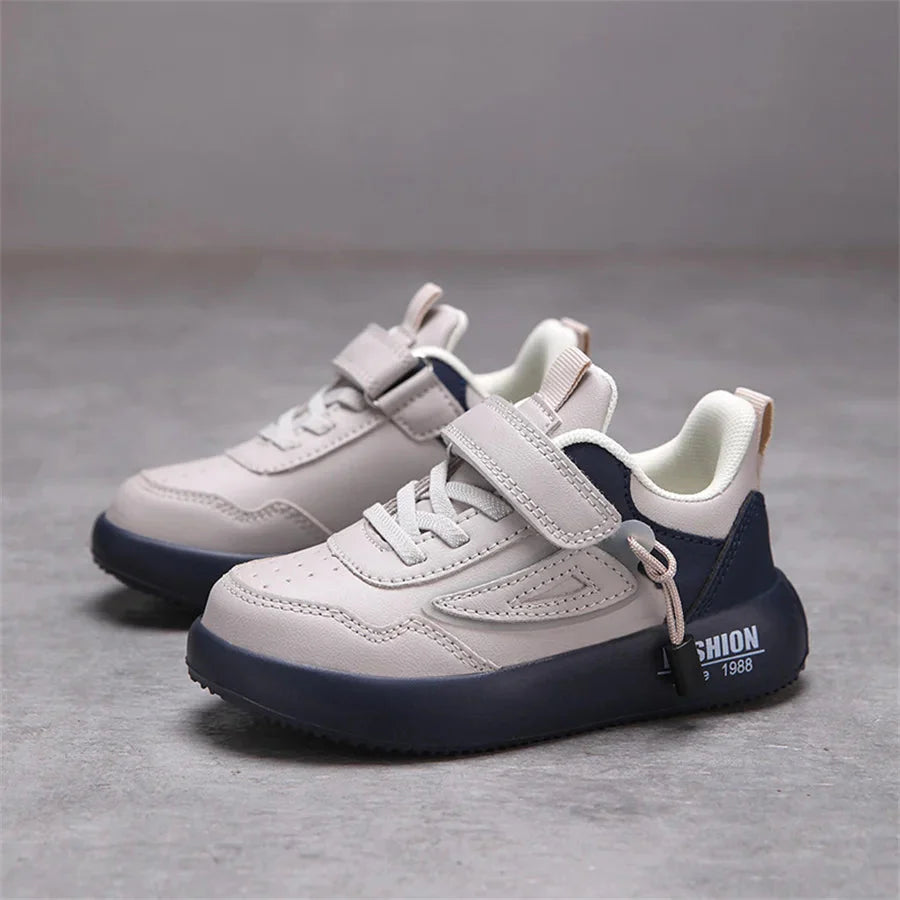 White leather kids' sneakers from QzsYog by SHOWLU FASHION STORE, breathable unisex casual sports shoes with sporty design.