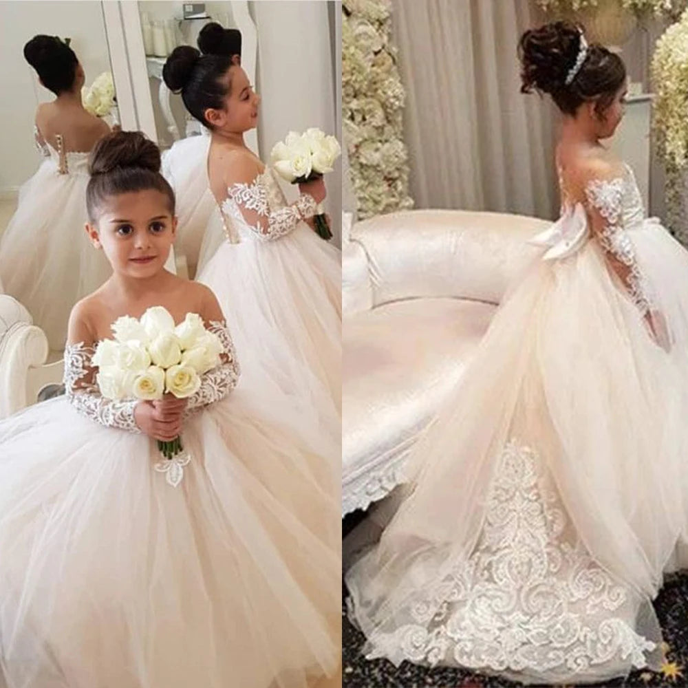 Baby lace flower girl dress with long sleeves and tulle skirt by Showlu Fashion, featuring floral lace details and a graceful design.