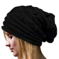 Women’s winter knitted slouchy beanie hat with warm wool, suitable for outdoor snow skiing and cold weather.