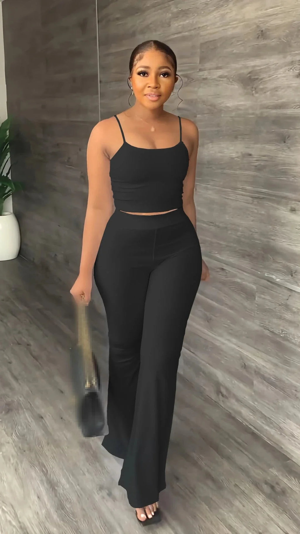 Stefion women's 2-piece summer set with sleeveless crop top and long pants, stylish and lightweight for warm weather.