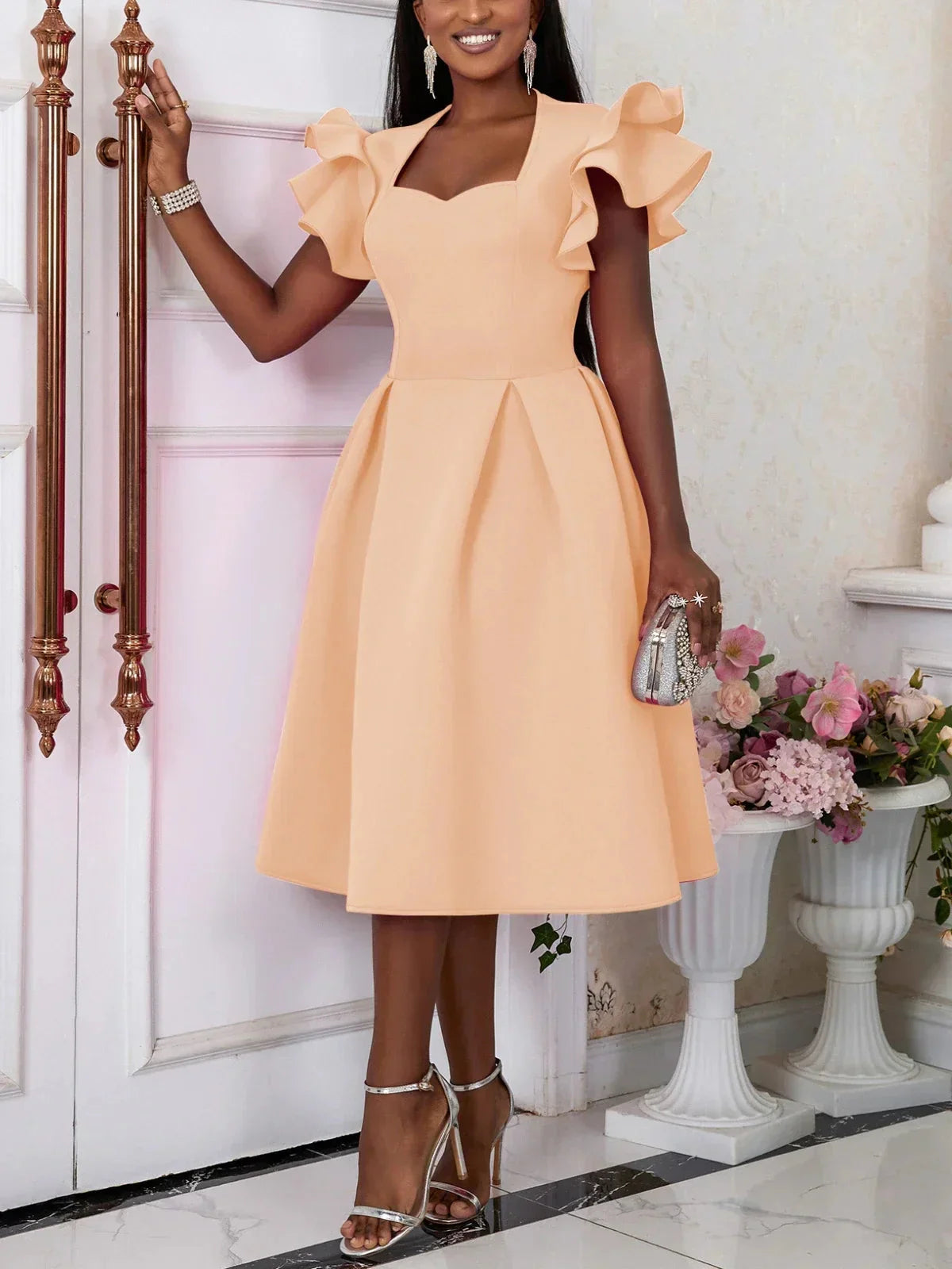 Aimee Women's Sweetheart Neck Fit and Flare Pleated Skater Dress in black, showcasing its flattering neckline and flared skirt.