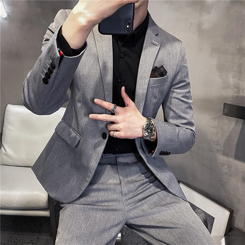 Men's British style business suit by Showlu Fashion, featuring a tailored 2-piece jacket and pants in classic design.